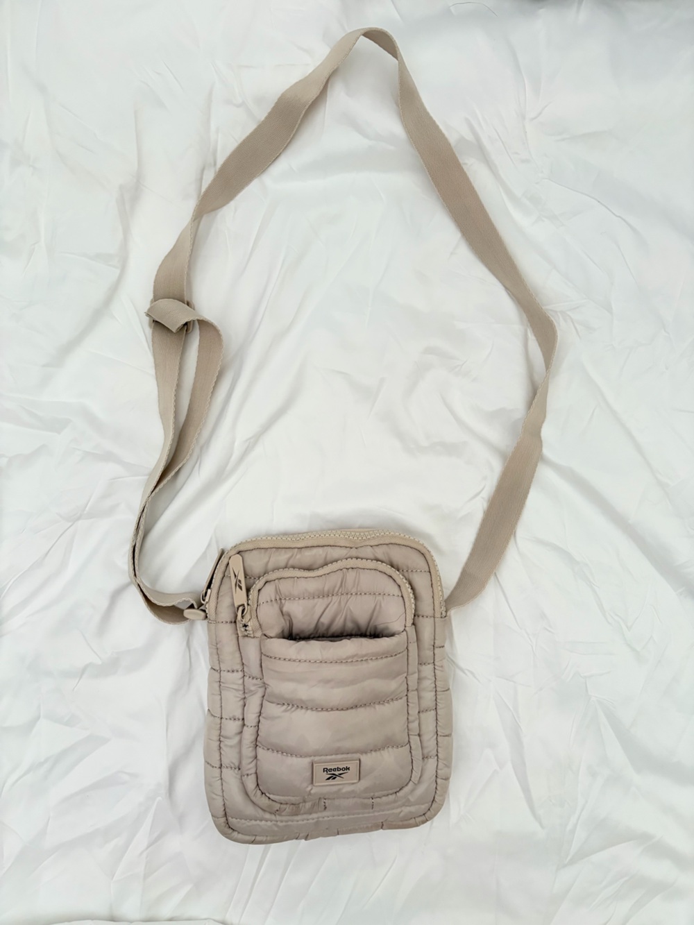 Reebok Quilted Crossbody Bag in Beige
